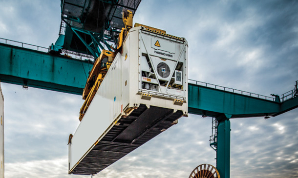 Photo showing Magnum Container being lifted from a ship